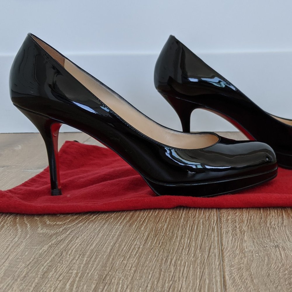 Christian Louboutin Round Toe Pumps
